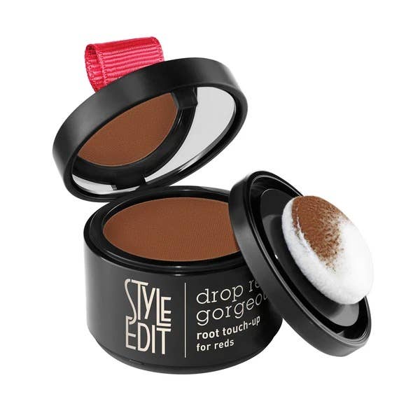 Open root touch-up powder compact in a medium brown shade with sponge applicator