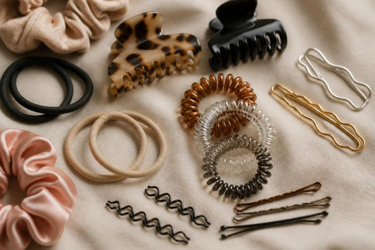 Assorted hair binders and ties securing ponytails and updos for salon-quality everyday styling The Pixie Garden