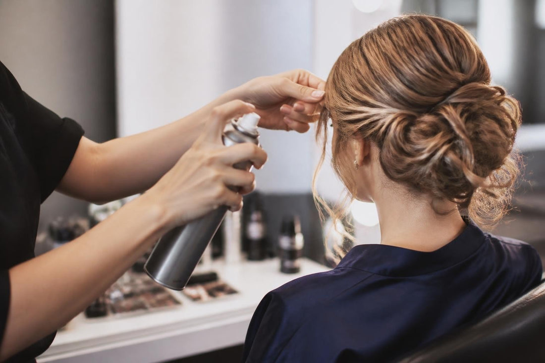 Elegant prom updo styled to last all night with salon finishing products by licensed cosmetologist The Pixie Garden