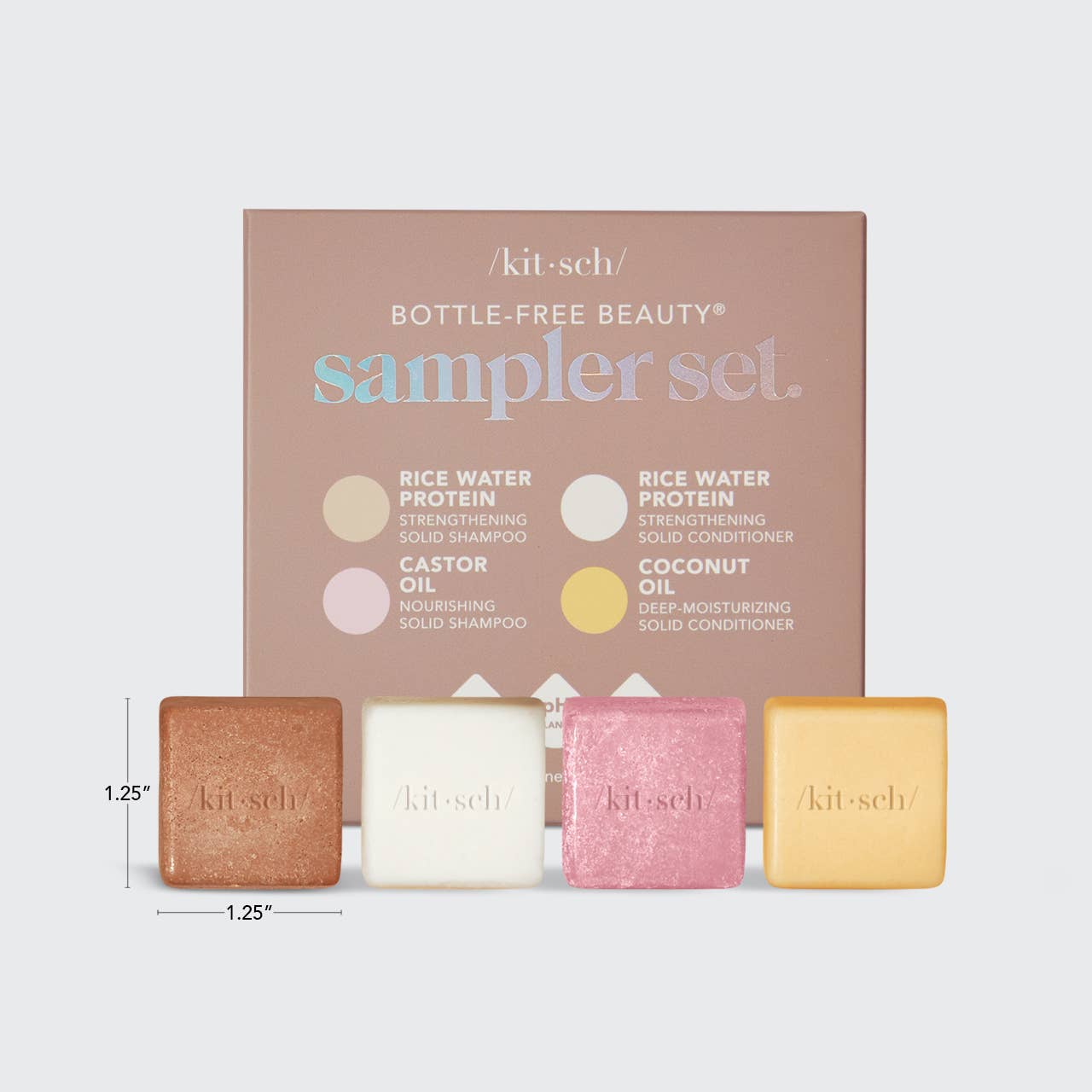 4 bottle-free beauty sampler set with four solid products and a box on a white background.