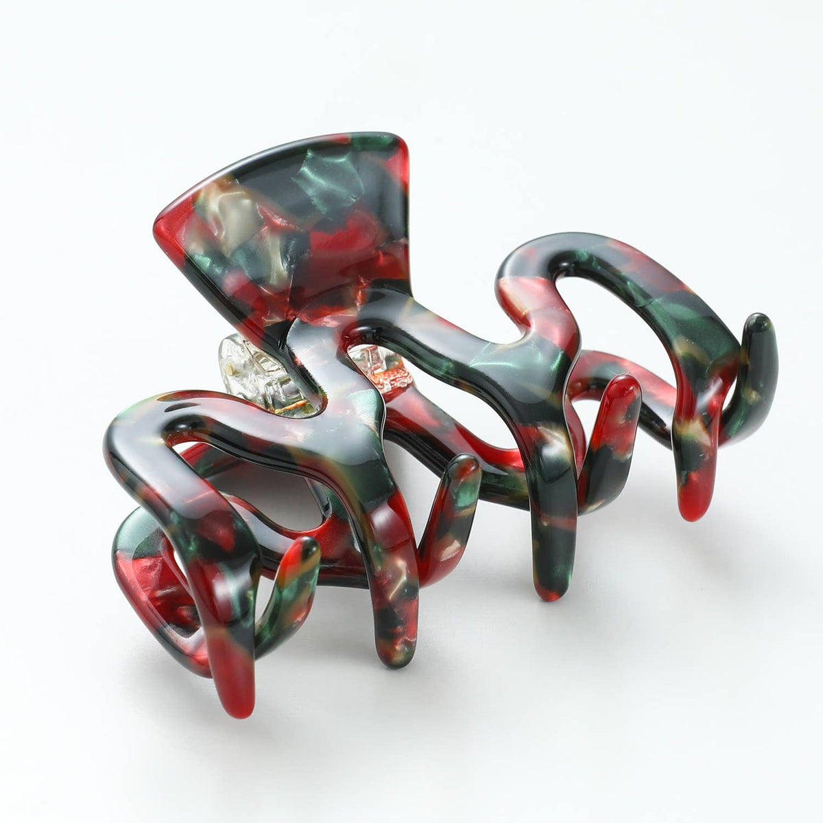 Open curved Vintage Christmas claw clip showing the hinge and spring mechanism