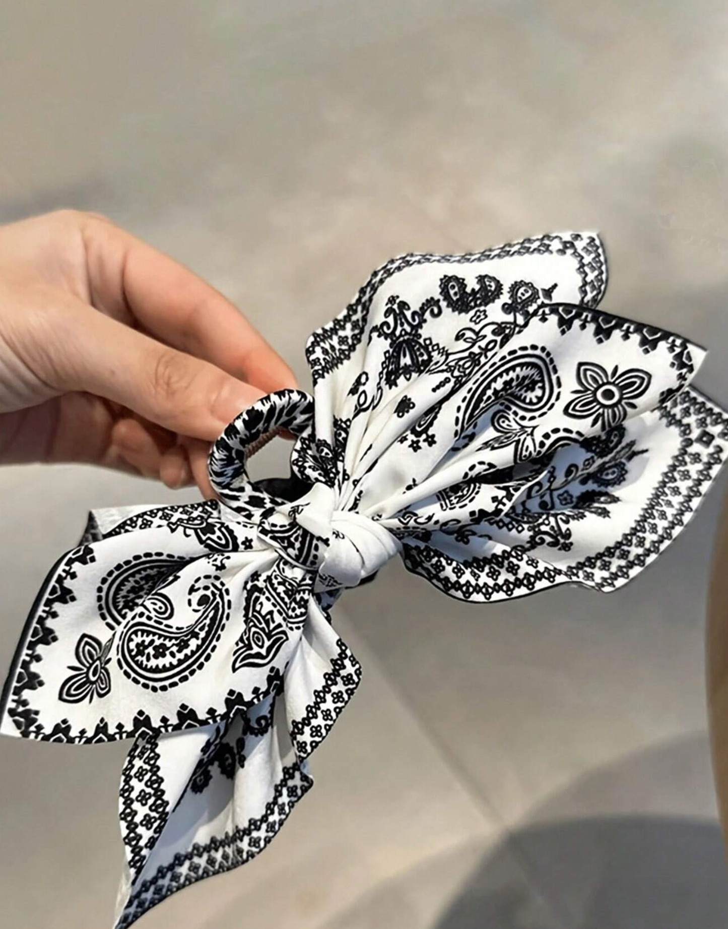 Oversized paisley print fabric bow barrette black and white salon selected