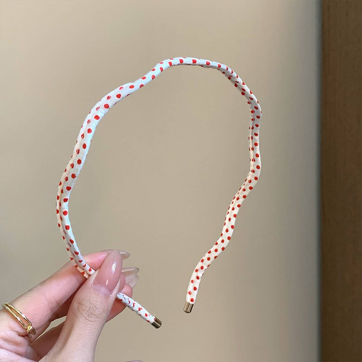 Beige polka dot wavy thin headband, salon-selected by The Pixie Garden