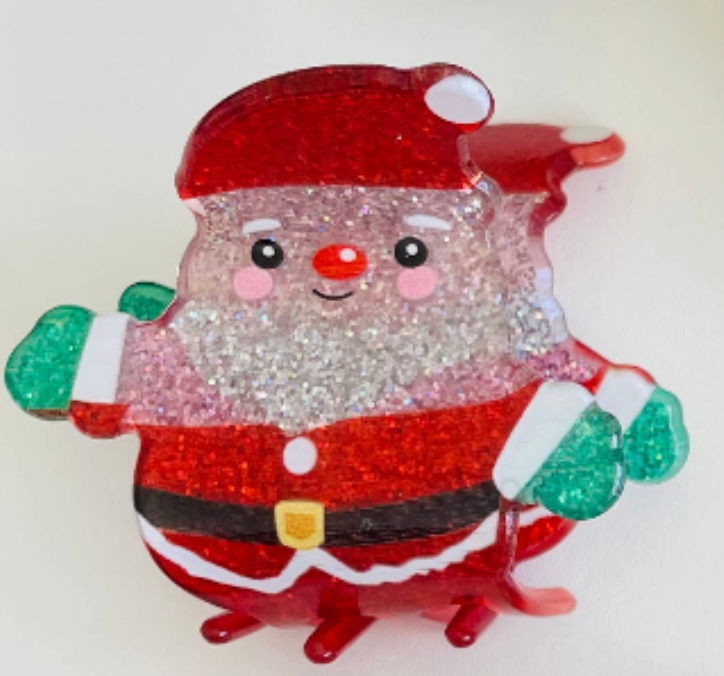 Red glitter Santa mini claw clip with a sparkling white beard and green mittens
