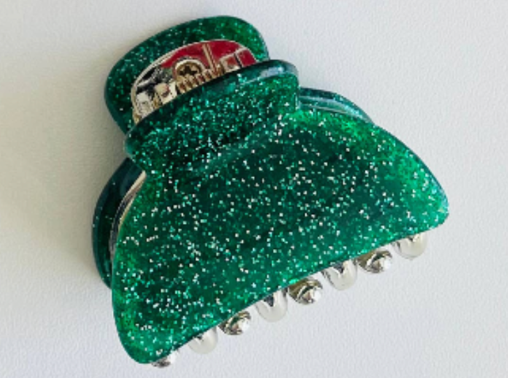 Deep green glitter mini claw clip with a small red truck detail at the top jaw
