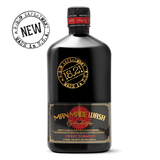 Black bottle of Man Made Wash Sweet Tobacco with gold and red text on a white background