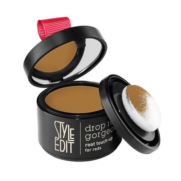 Open root touch-up powder compact in a light brown shade with sponge applicator
