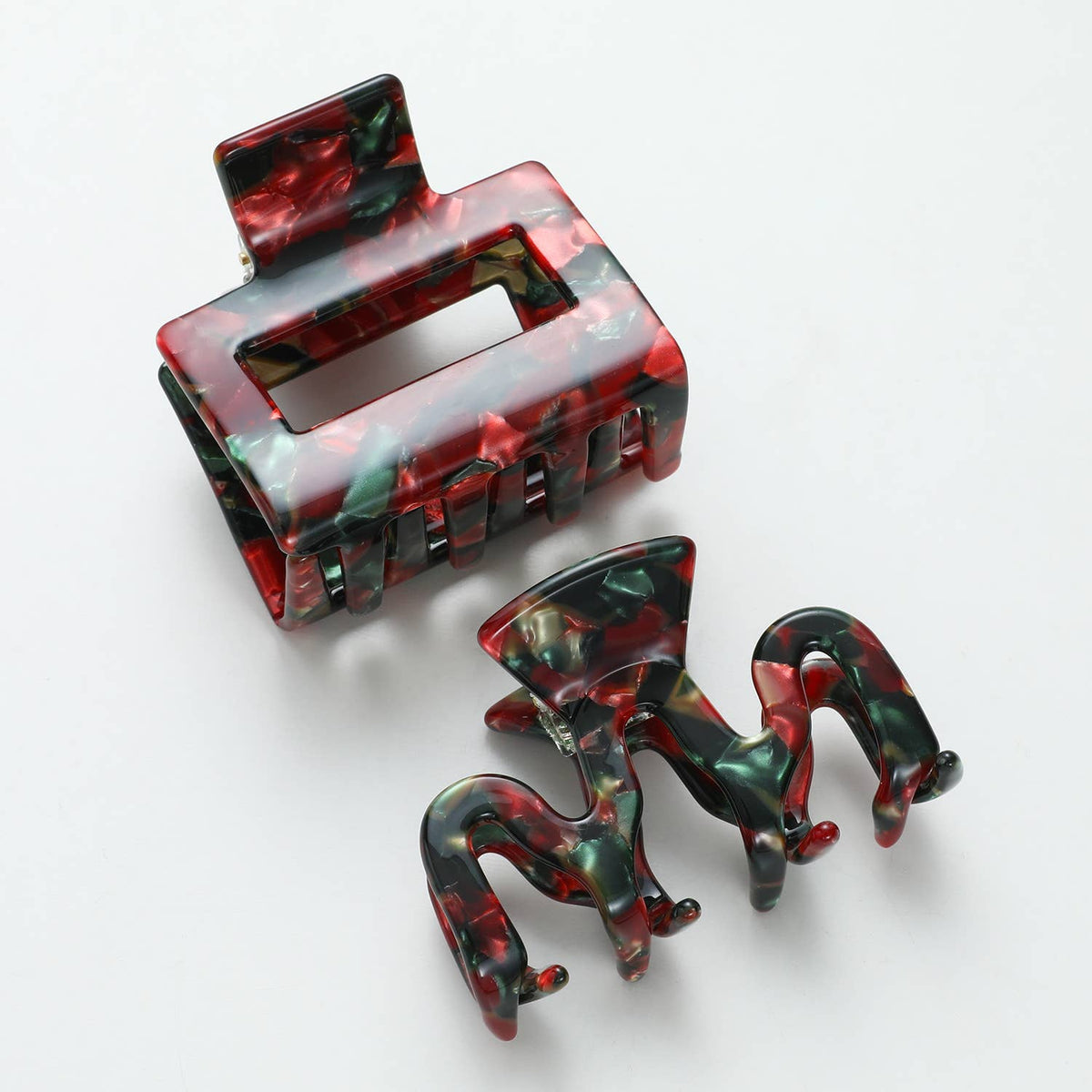 Rectangle and small octopus Vintage Christmas claw clips angled on a white background