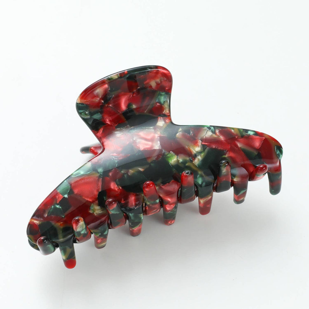 Curved Vintage Christmas claw clip lying flat, showing the marbled holiday print across the body
