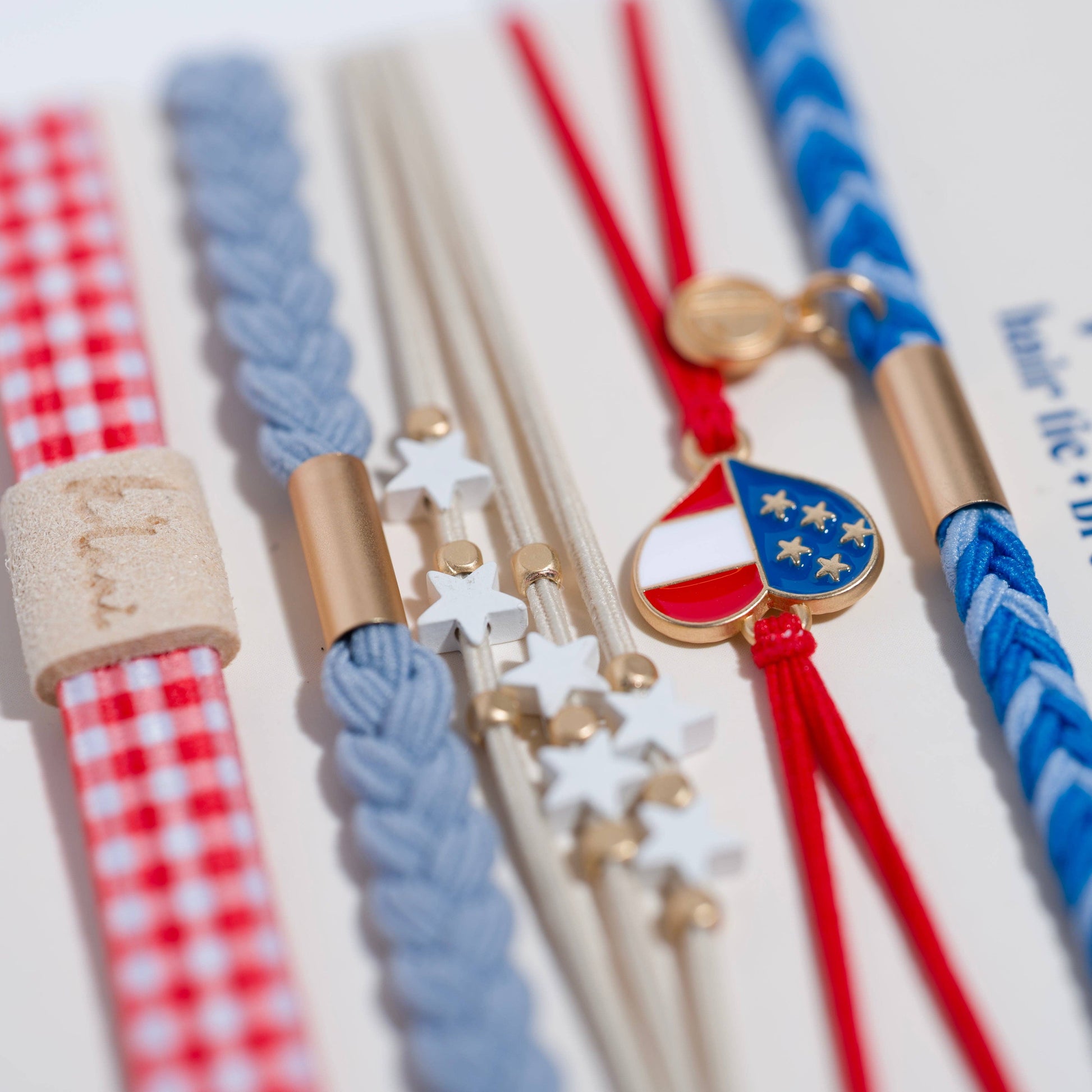 Free patriotic hair ties with white star and heart charm detail The Pixie Garden